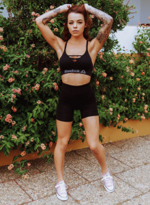 Puffy nipples redhead is outdoor in black tight sports shorts and bra