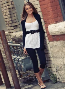 Beautiful brunette in tight white dress and black spandex has tasty puffy nipples body