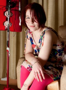 Hairy pussy redhead with puffy nipples wearing pink spandex