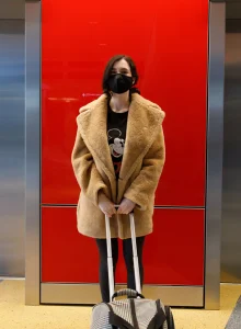 Hot busty brunette Giulia Wylde in black spandex is flashing tits in public hotel places