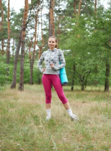 Nude yoga in the forest in pink spandex with puffy nipples