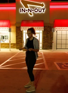 Perfect body girl is in the shop wearing tight black spandex