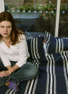 Redhead in tight blue jeans has sexy body with hairy beaver