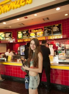 Sexy teen is flashing young tits and hairy beaver outside in tight jeans shorts