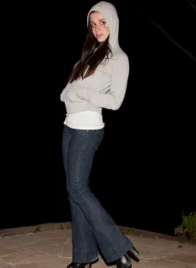 Tall girl wearing blue jeans and short