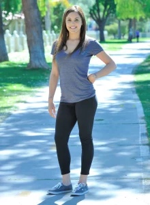 Wonderful busty girl is running in tight black in the park flashing her puffy nipples